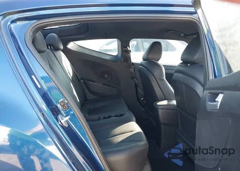 2016 Hyundai Veloster Turbo z USA, uszkodzony, nr VIN KMHTC6AE1GU294945